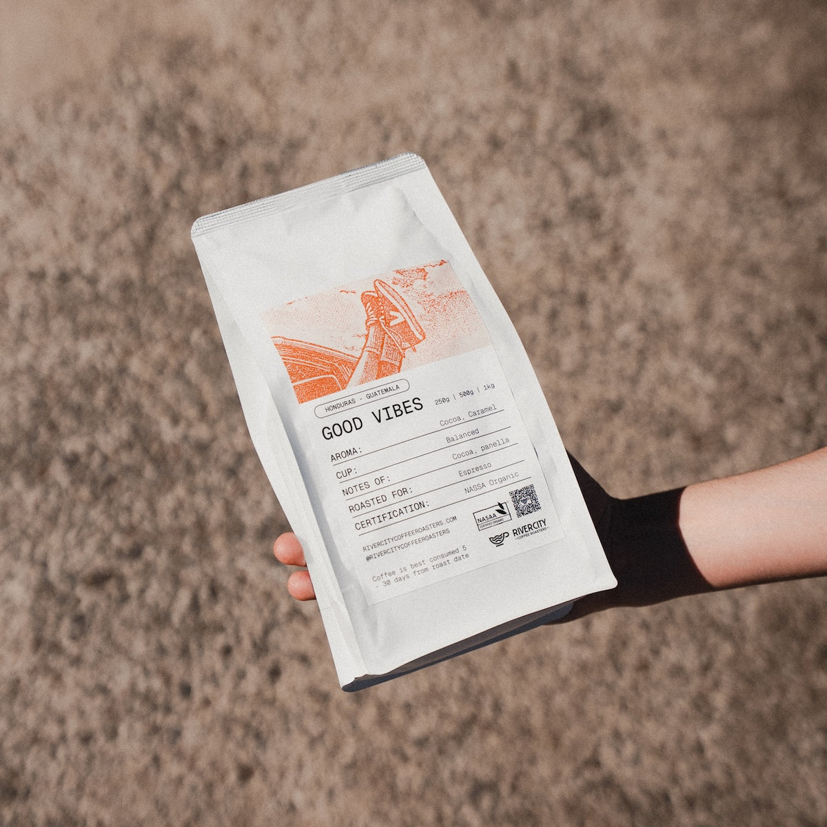 Bag of River City Coffee Roasters Good Vibes organic blend held in hand